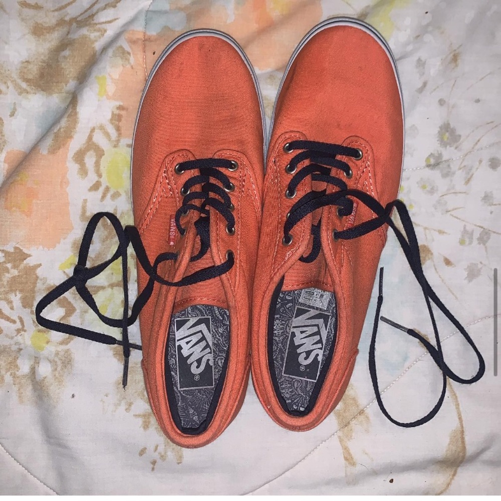 Orange vans with navy laces